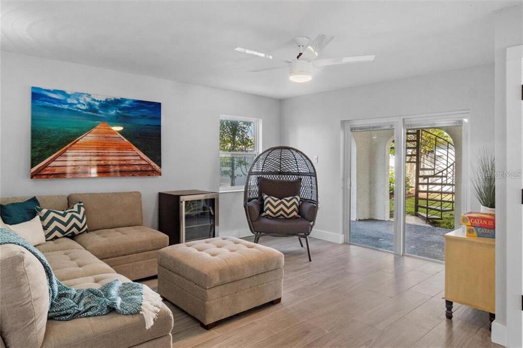 307 161st Avenue Redington Beach, FL 33708 - Photo 28 of 39 a living room with furniture and a window
