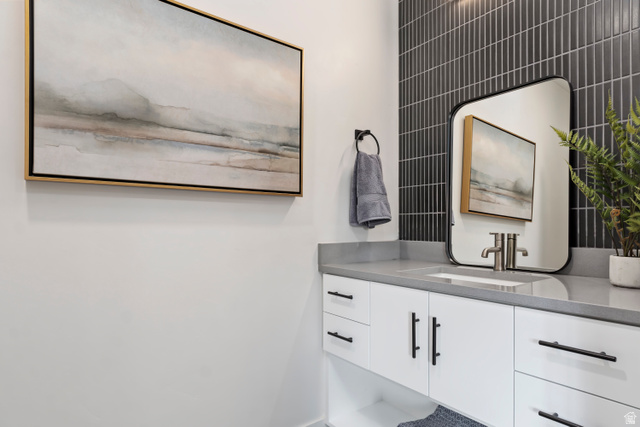 32 West 400 South Bountiful, UT 84010 - Photo 15 of 31 Half bathroom with vanity and baseboards. Model Home
