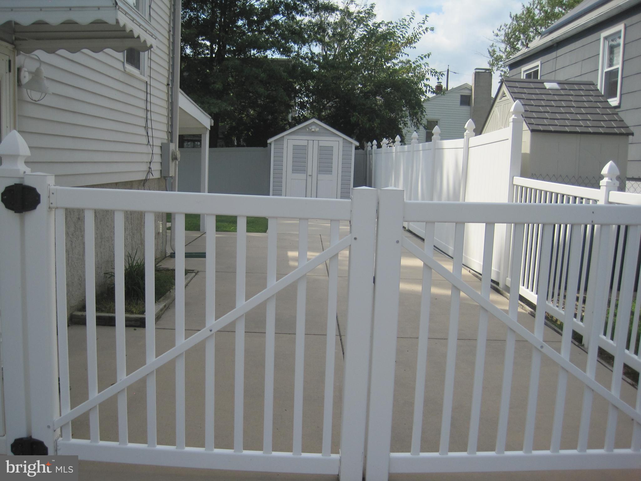 7910 Highpoint Road Baltimore, MD 21234 - Photo 5 of 53 Vinyl Fence Gates for Secure Parking