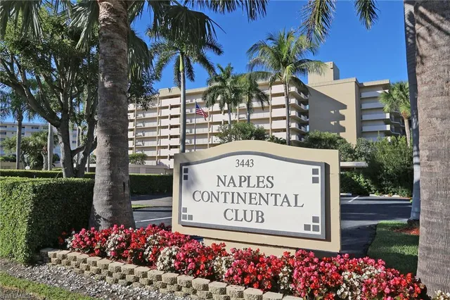 a sign on the side of the road