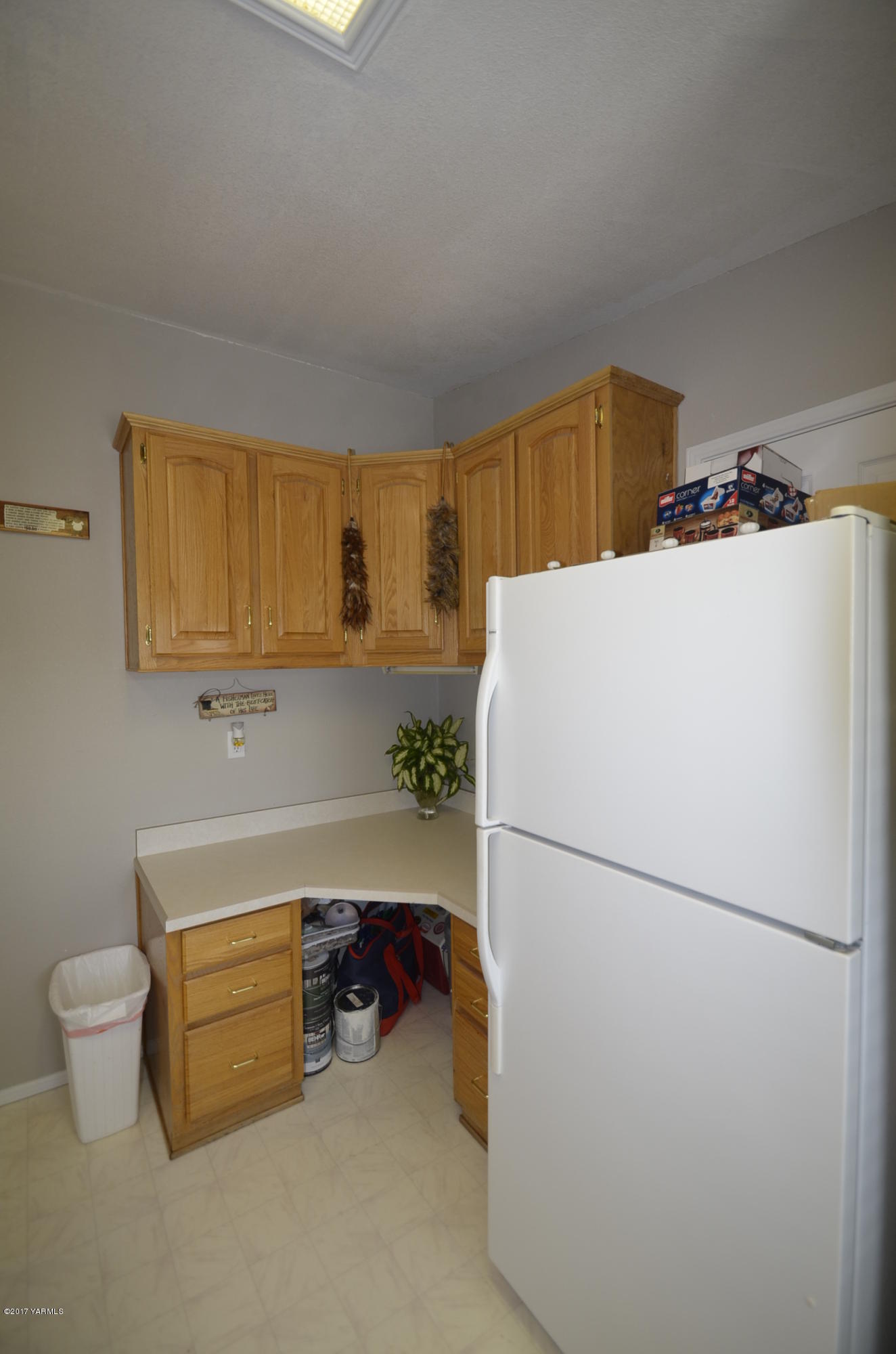 1454 Konnowac Pass Road Moxee, WA 98936 - Photo 17 of 34 a storage room with cabinets