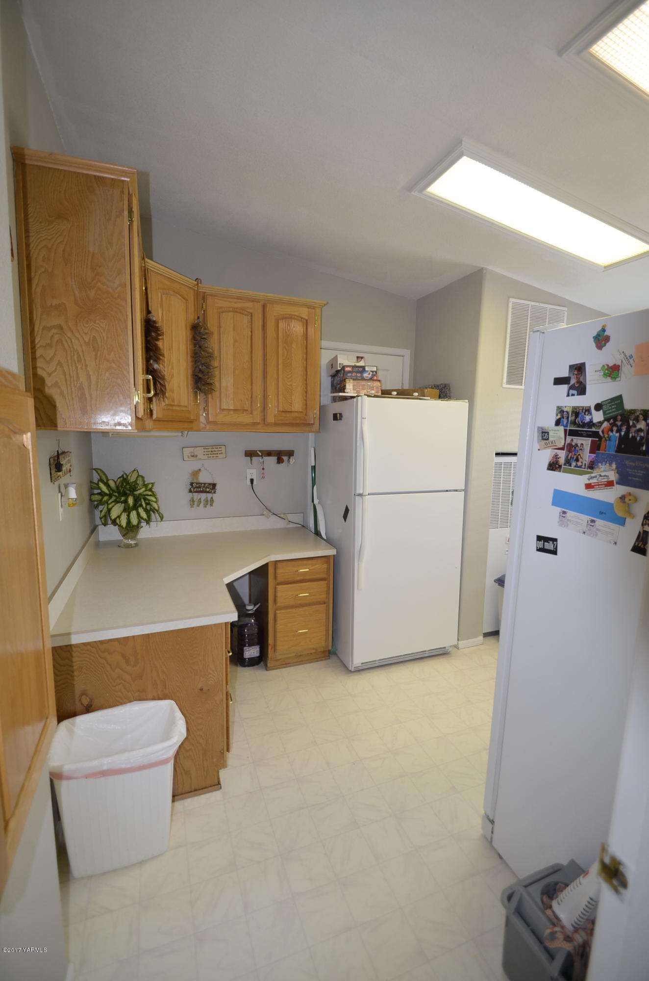 1454 Konnowac Pass Road Moxee, WA 98936 - Photo 18 of 34 a utility room with cabinets washer and dryer