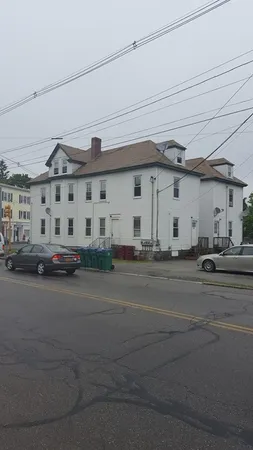 a kitchen with stainless steel appliances granite countertop a stove and a refrigerator