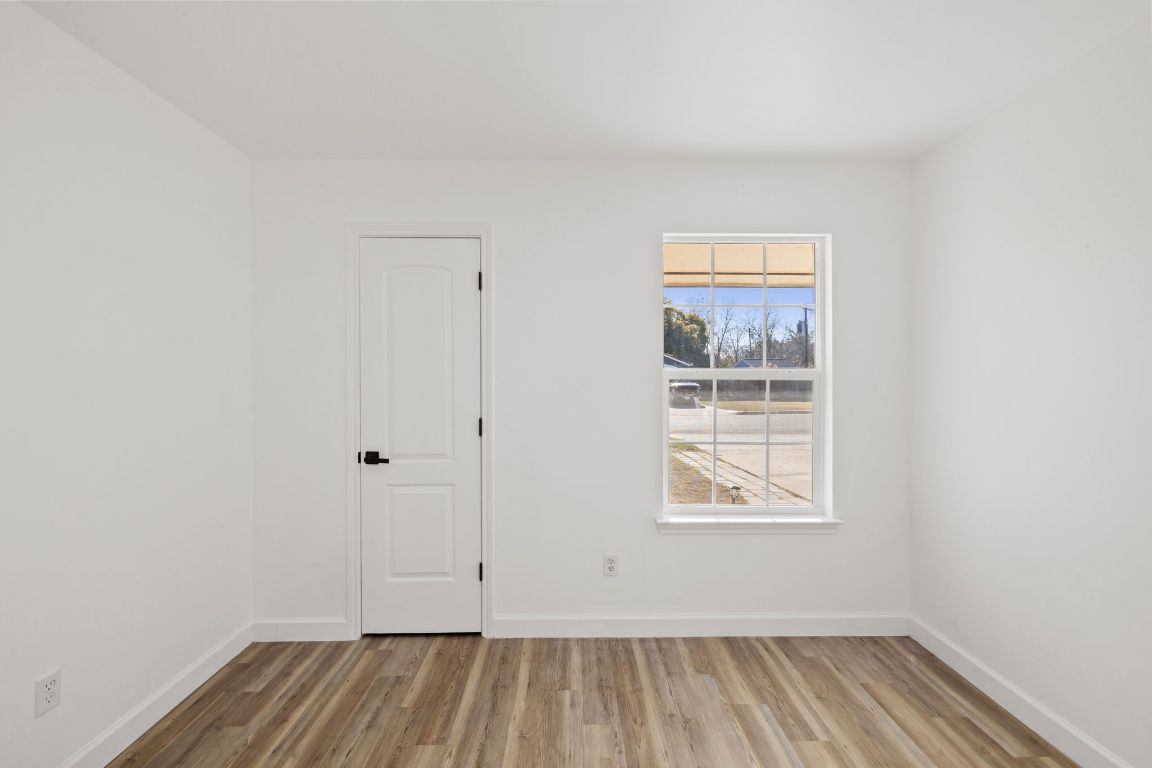 902 Virginia Drive Round Rock, TX 78664 - Photo 20 of 33 an empty room with a window