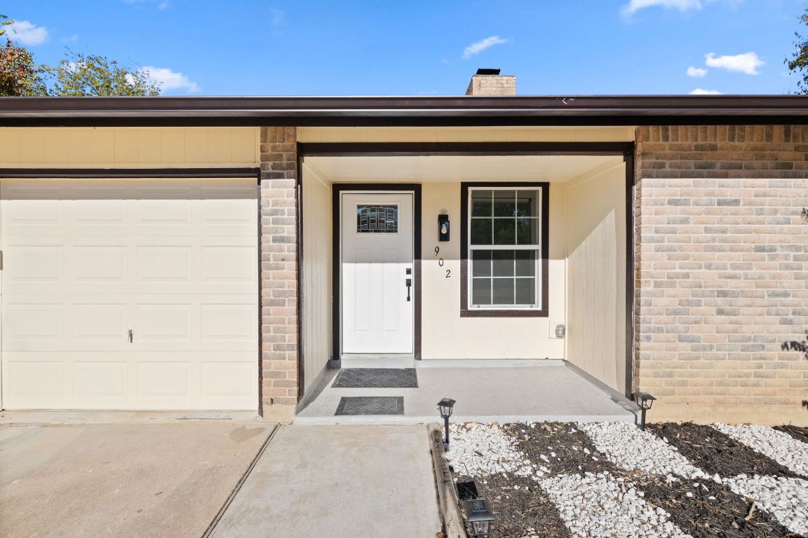 902 Virginia Drive Round Rock, TX 78664 - Photo 4 of 33 a front view of a house with a large window
