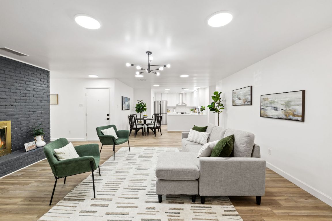 902 Virginia Drive Round Rock, TX 78664 - Photo 8 of 33 a living room with furniture and kitchen view