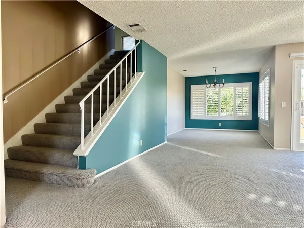 a view of an entryway with staircase