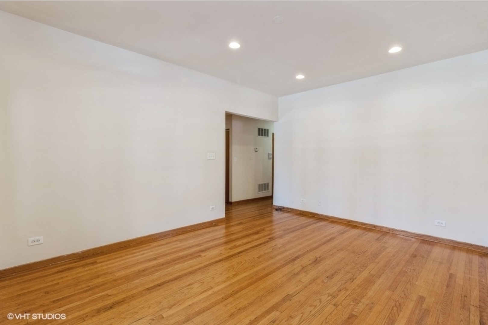Undisclosed Address Chicago, IL 60647 - Photo 11 of 15 a view of an empty room with wooden floor and closet