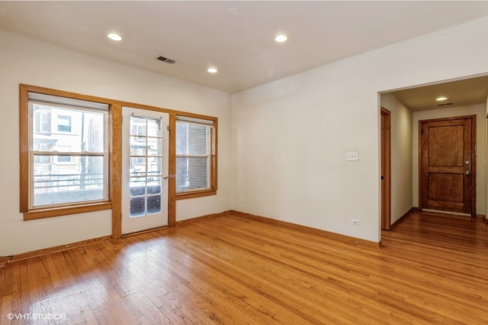 Undisclosed Address Chicago, IL 60647 - Photo 5 of 15 wooden floor in an empty room with a window