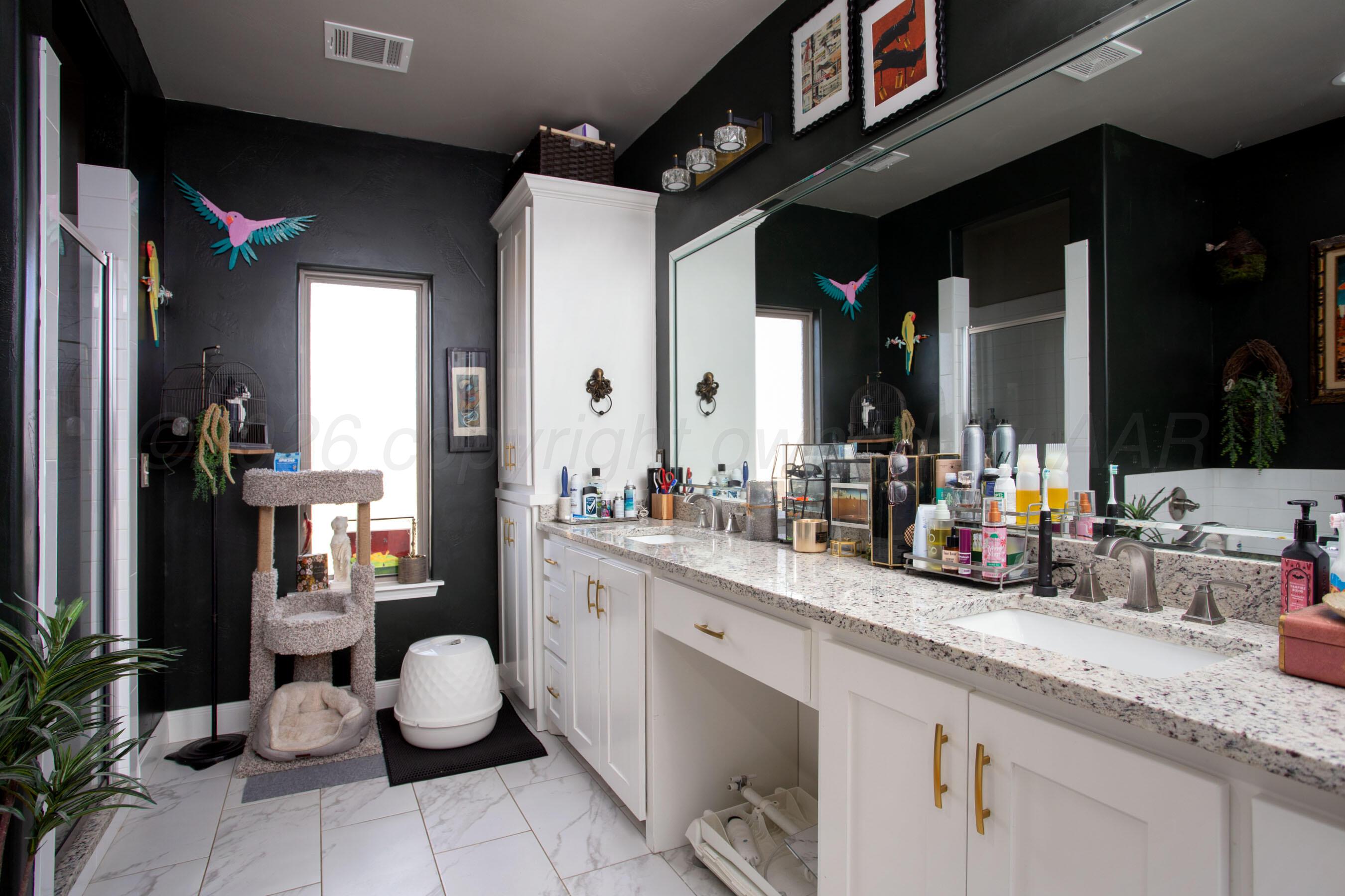 8200 Matilda Lane Amarillo, TX 79119 - Photo 18 of 39 a kitchen with a sink and cabinets