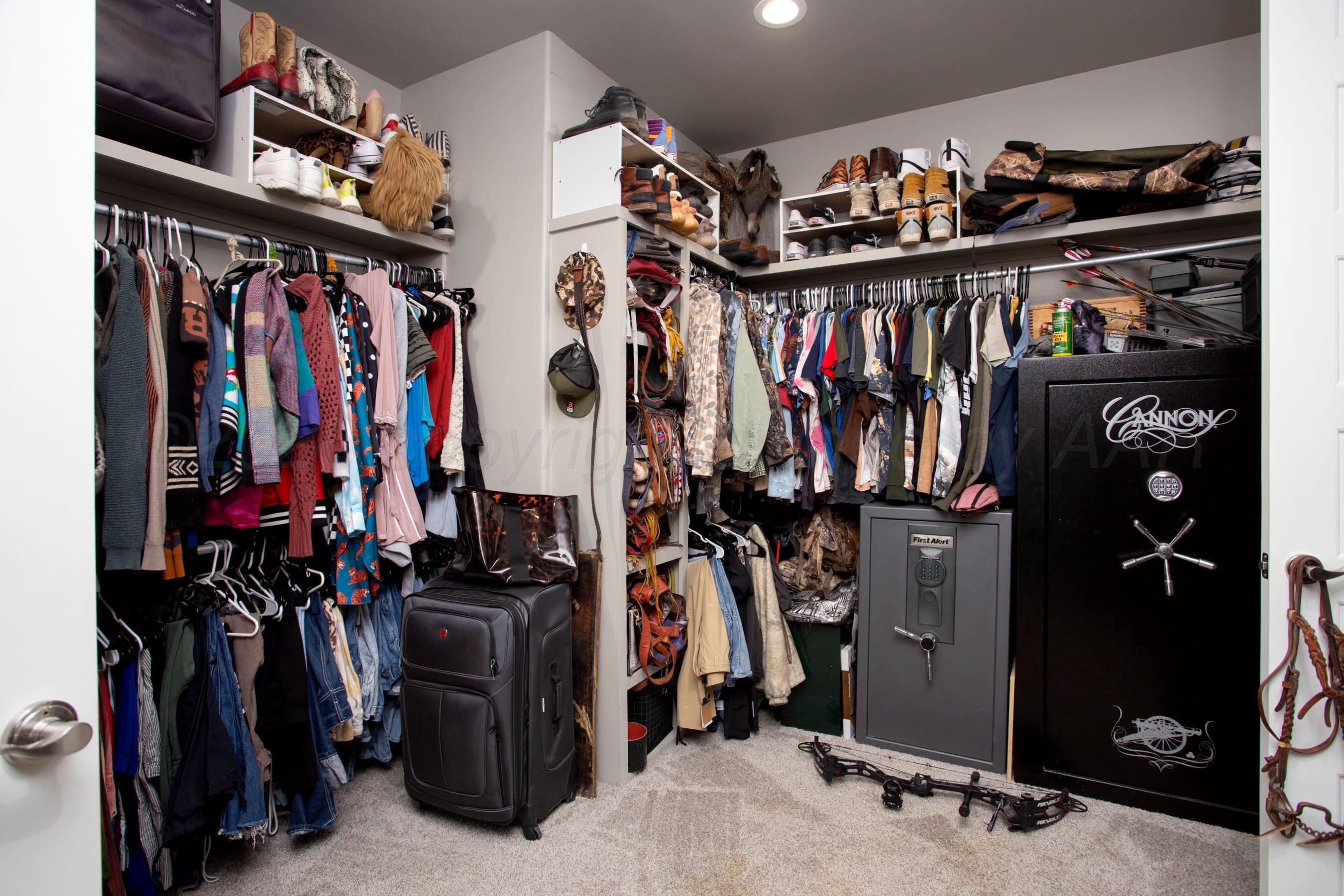 8200 Matilda Lane Amarillo, TX 79119 - Photo 21 of 39 a view of walk in closet with clothes