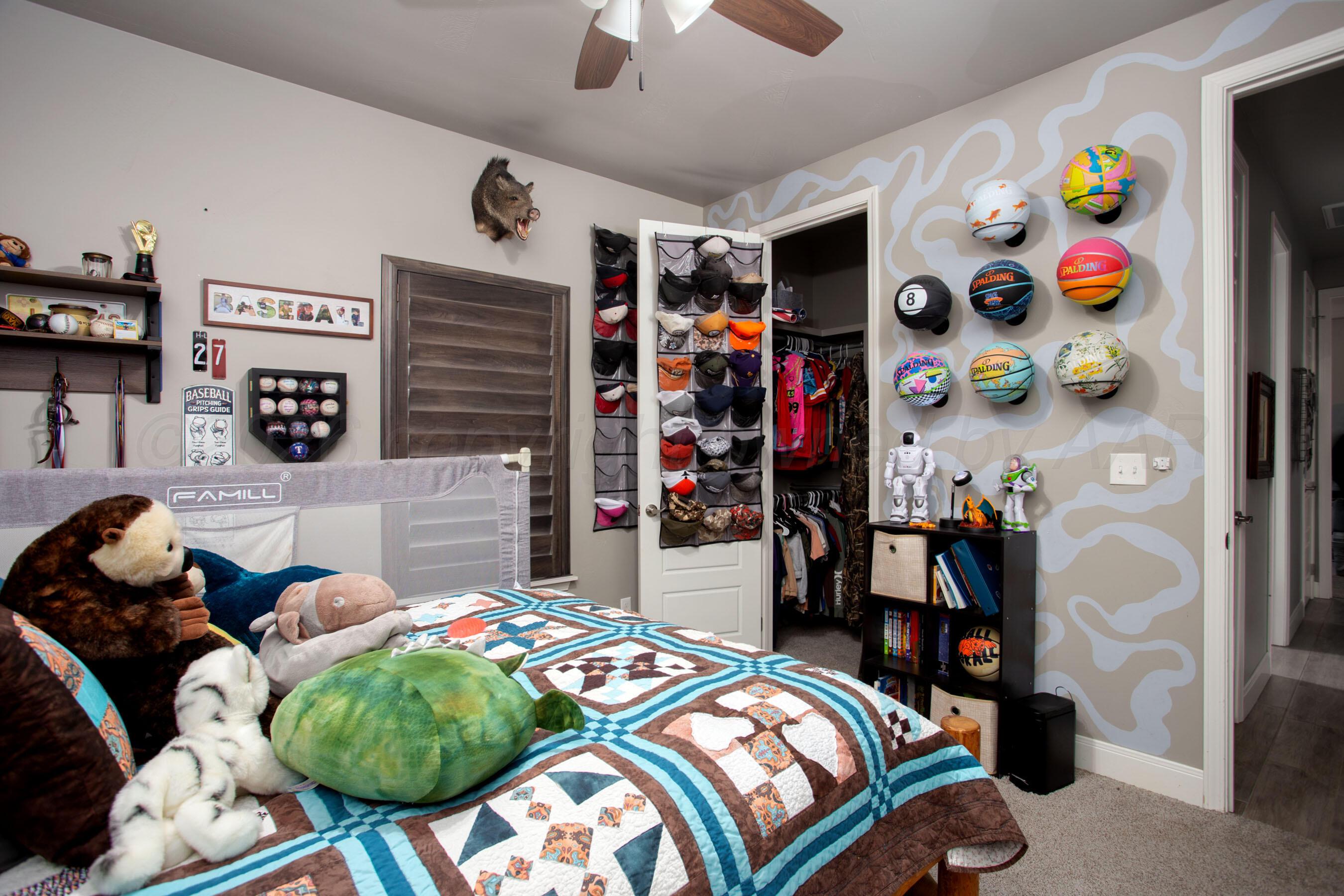 8200 Matilda Lane Amarillo, TX 79119 - Photo 25 of 39 a bedroom with bed and a window