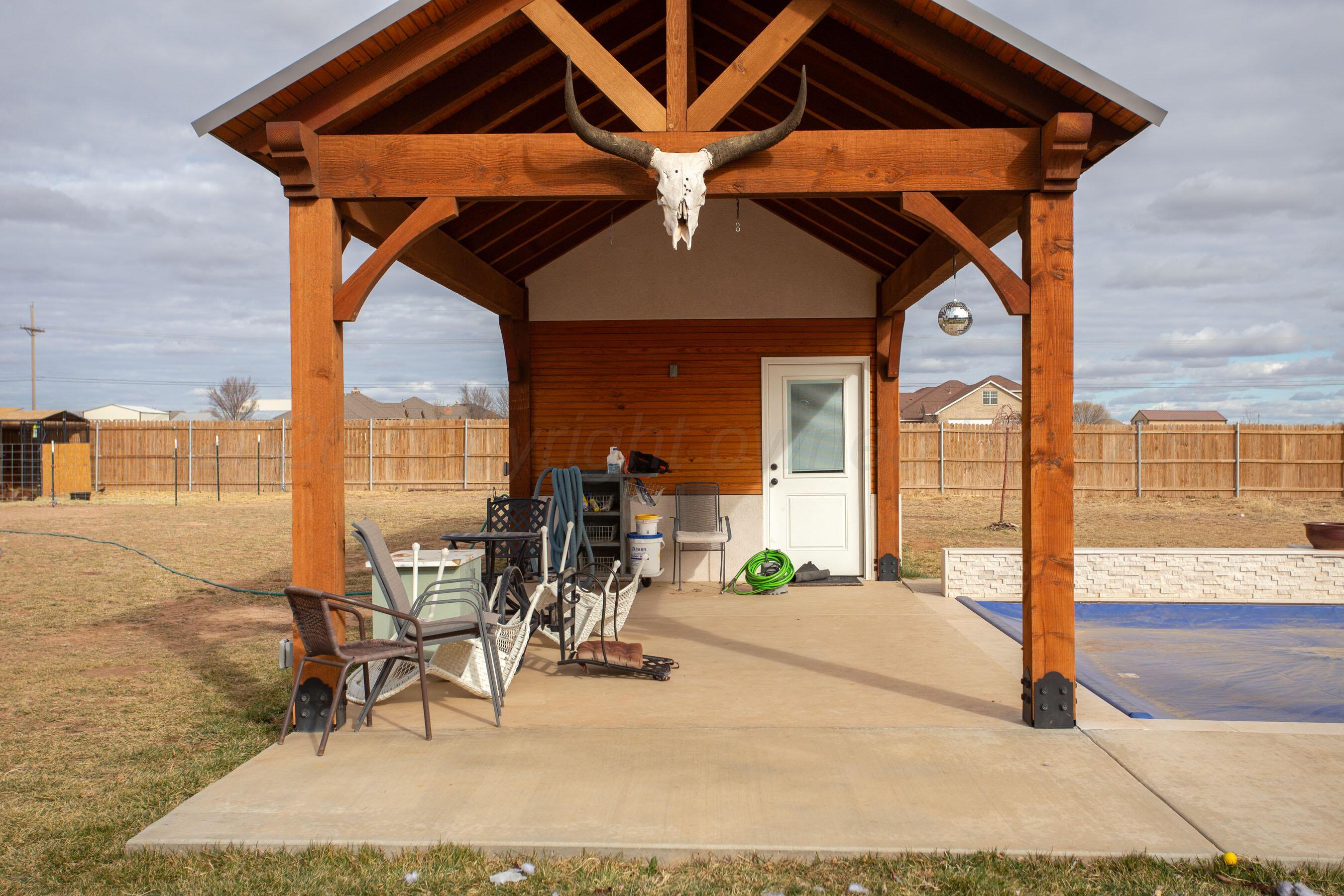8200 Matilda Lane Amarillo, TX 79119 - Photo 28 of 39 a patio with table and chairs