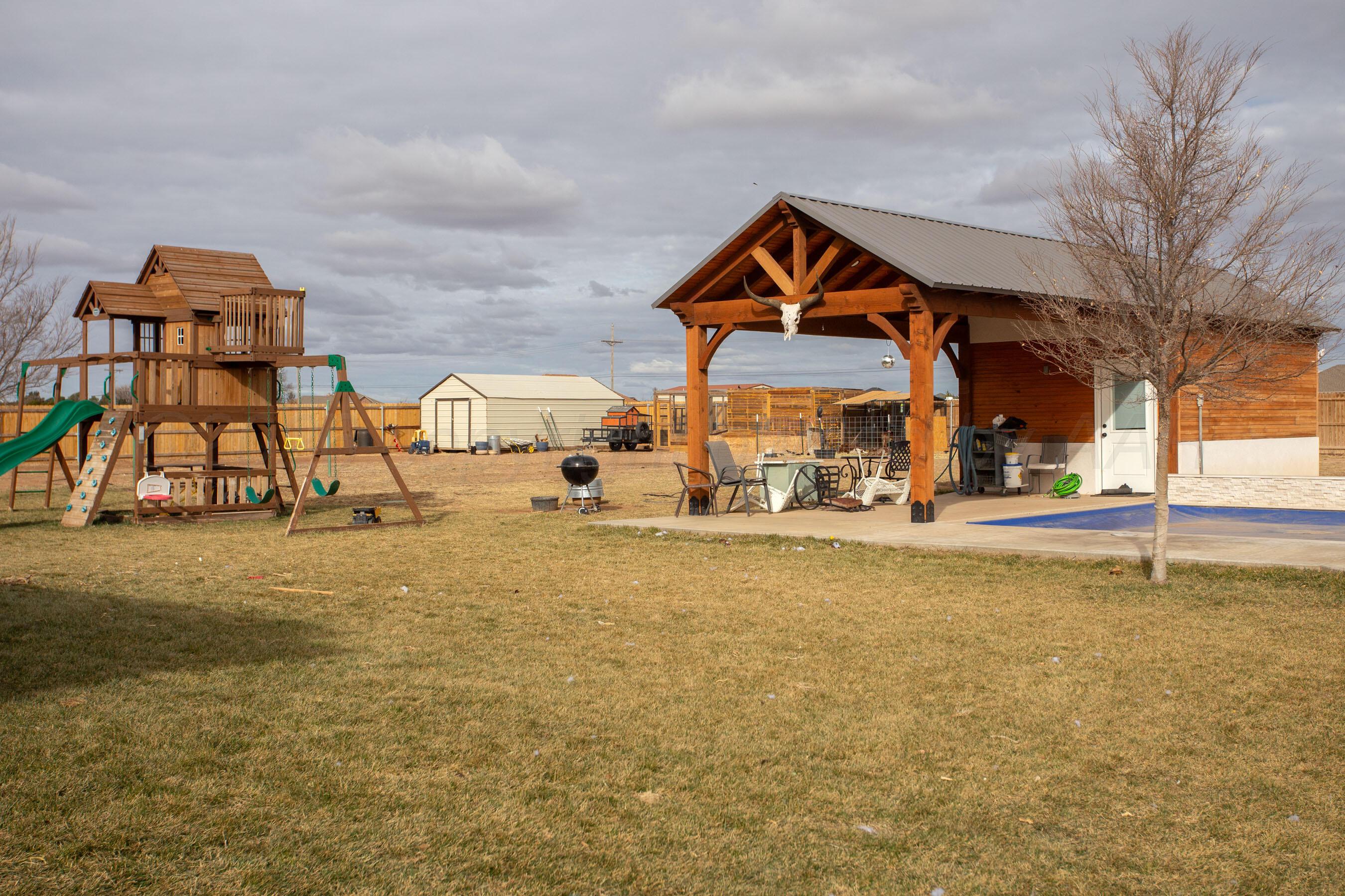 8200 Matilda Lane Amarillo, TX 79119 - Photo 31 of 39 a house with trees in front of it