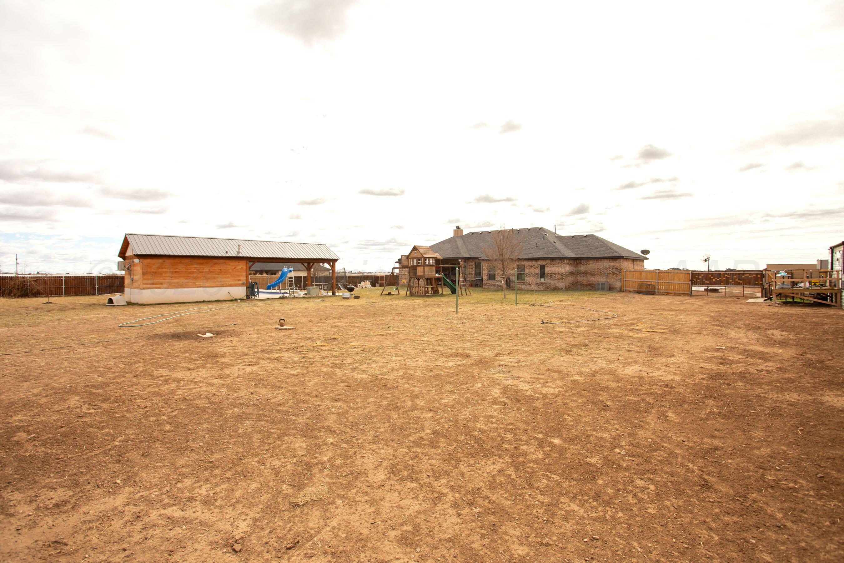 8200 Matilda Lane Amarillo, TX 79119 - Photo 37 of 39 view of house with ocean view