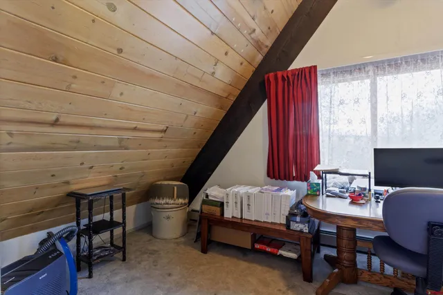 a room with furniture and a window