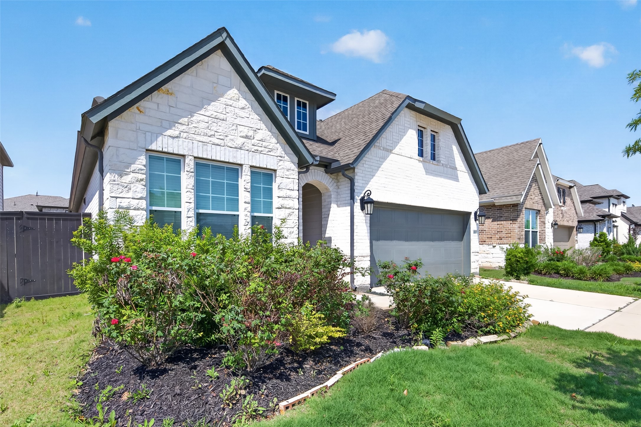 211 Amaranth Way Richmond, TX 77406 - Photo 2 of 26 front view of a house with a yard
