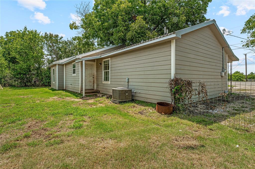 409 Morgan Mill Road Stephenville, TX 76401 - Photo 22 of 25 a view of a back yard of the house