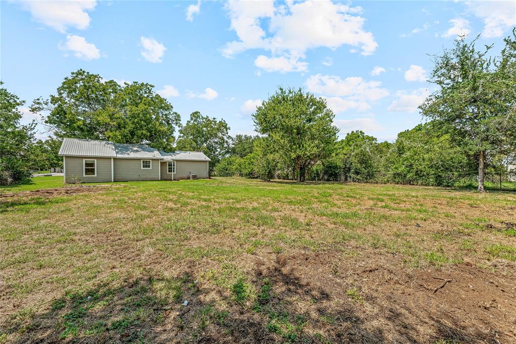 409 Morgan Mill Road Stephenville, TX 76401 - Photo 25 of 25 a house view with a outdoor space