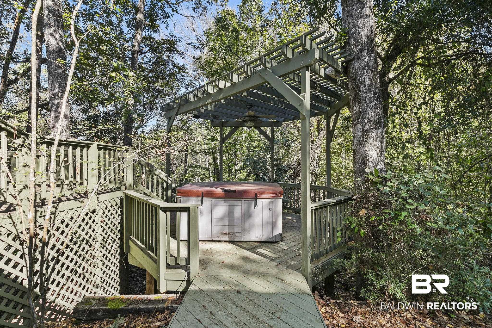 13 Bugle Retreat Daphne, AL 36527 - Photo 29 of 40 Deck featuring a pergola, a hot tub, and ceiling fan