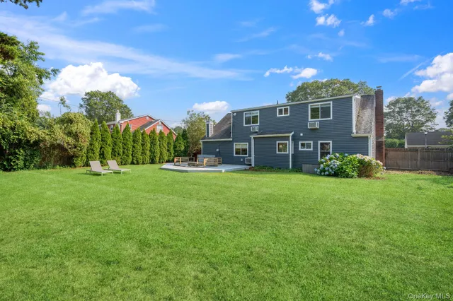 a view of a house with a big yard