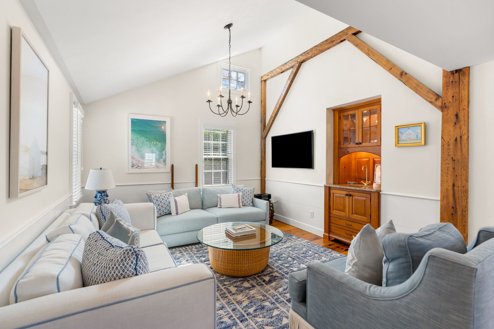 39 A Milk Street Nantucket, MA 02554 - Photo 12 of 56 a living room with furniture a flat screen tv and a window