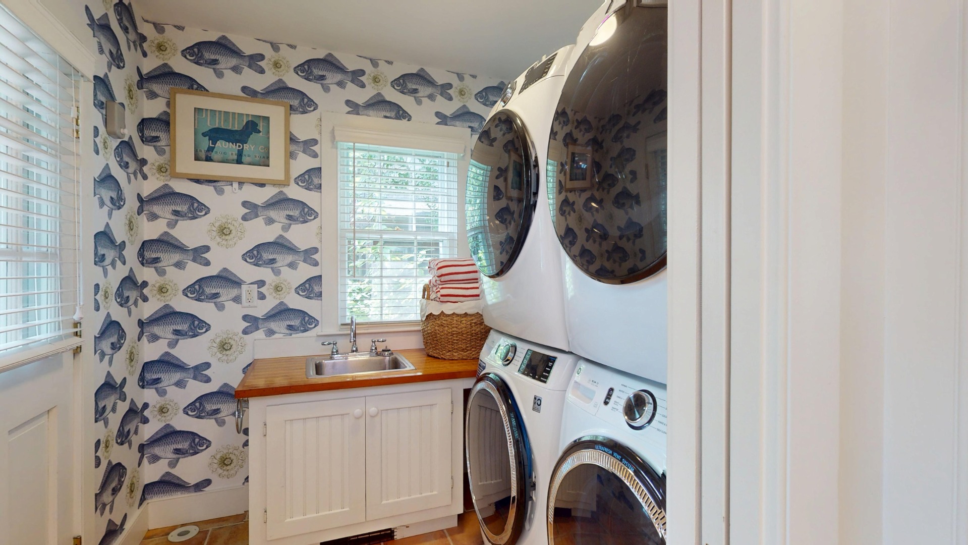 39 A Milk Street Nantucket, MA 02554 - Photo 19 of 56 a utility room with dryer and washer