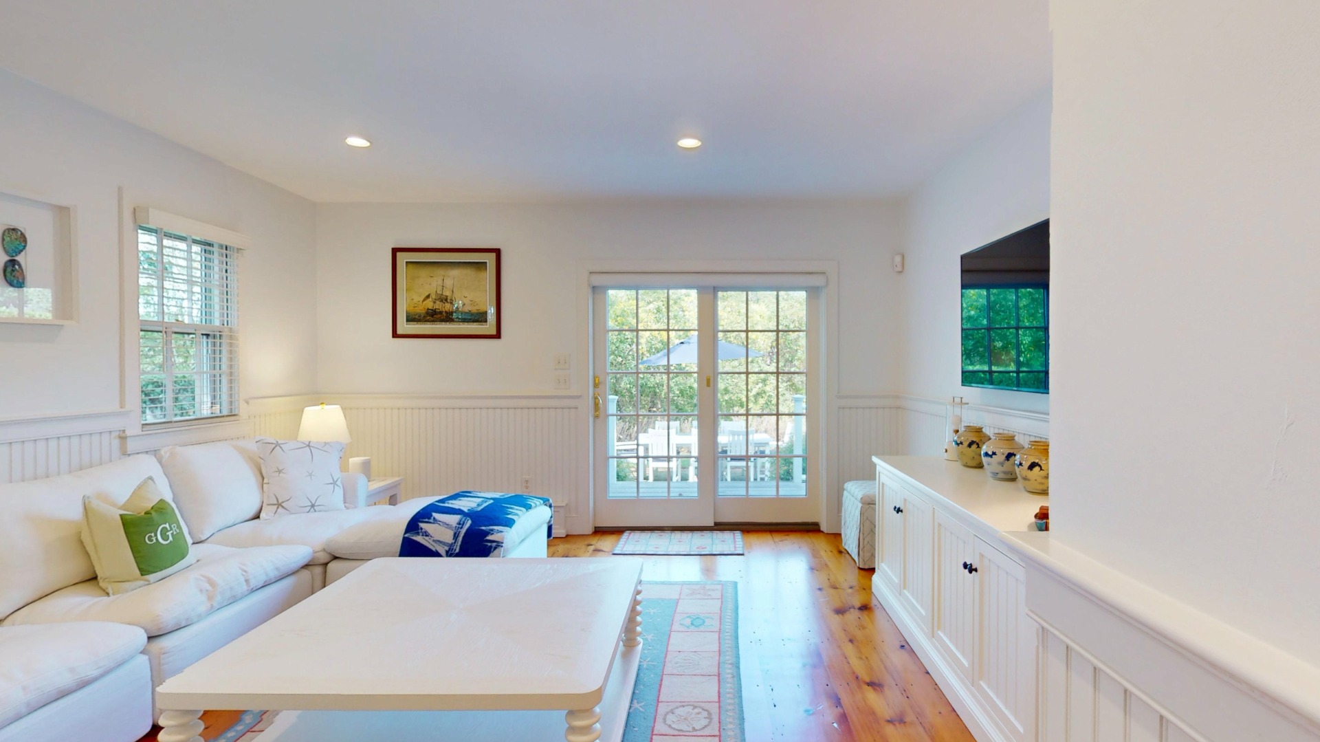 39 A Milk Street Nantucket, MA 02554 - Photo 20 of 56 a living room with furniture and a large window