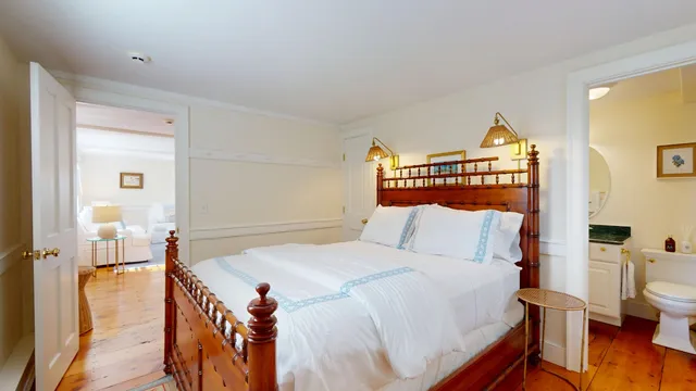 a bed room with two bed and a couch