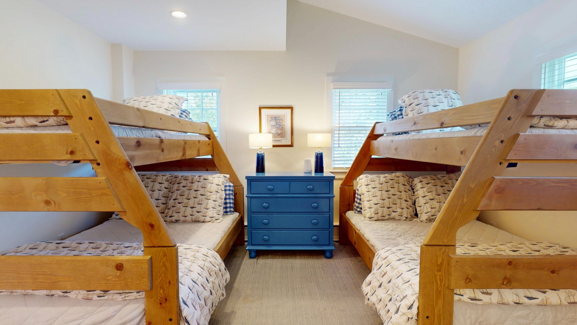39 A Milk Street Nantucket, MA 02554 - Photo 28 of 56 a bed room with two bed and a couch