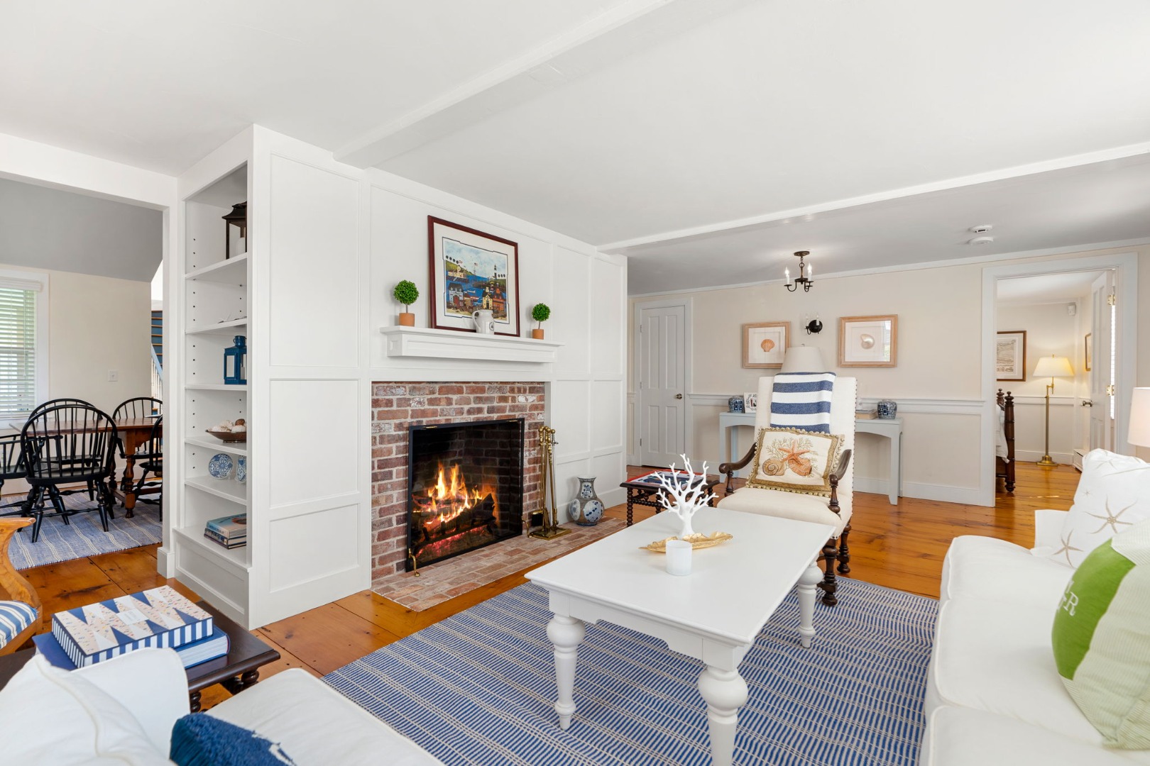 39 A Milk Street Nantucket, MA 02554 - Photo 3 of 56 a living room with furniture and a fireplace