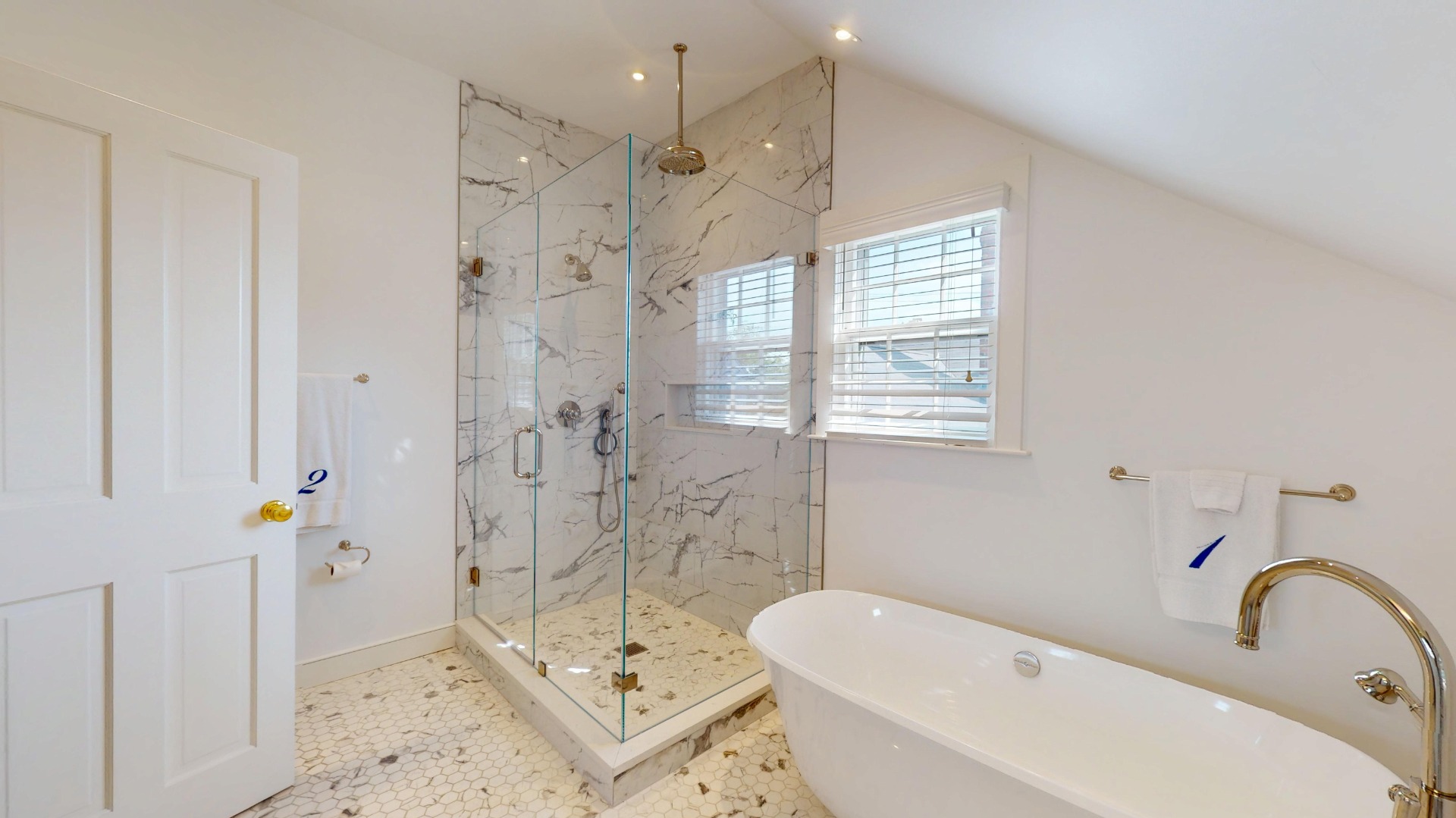 39 A Milk Street Nantucket, MA 02554 - Photo 36 of 56 a bathroom with a sink toilet and shower