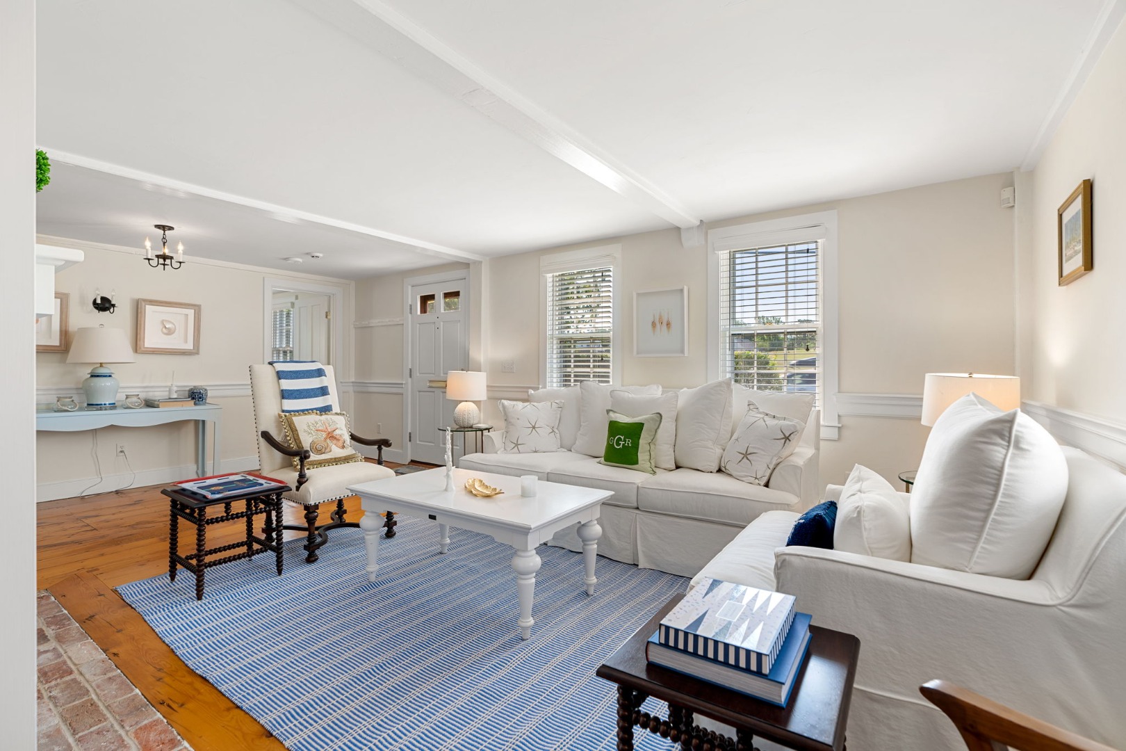 39 A Milk Street Nantucket, MA 02554 - Photo 4 of 56 a living room with furniture a wooden floor and next to a window