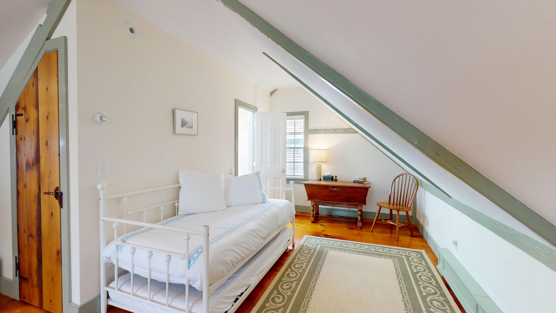 39 A Milk Street Nantucket, MA 02554 - Photo 41 of 56 a living room with furniture and a rug
