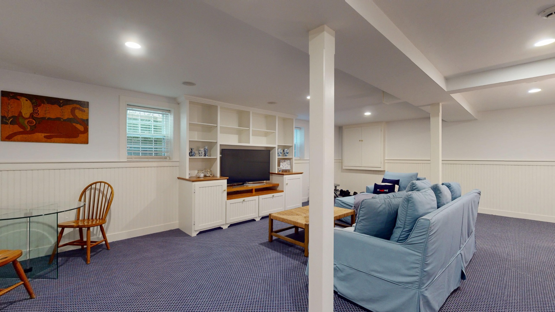 39 A Milk Street Nantucket, MA 02554 - Photo 46 of 56 a living room with furniture and a flat screen tv