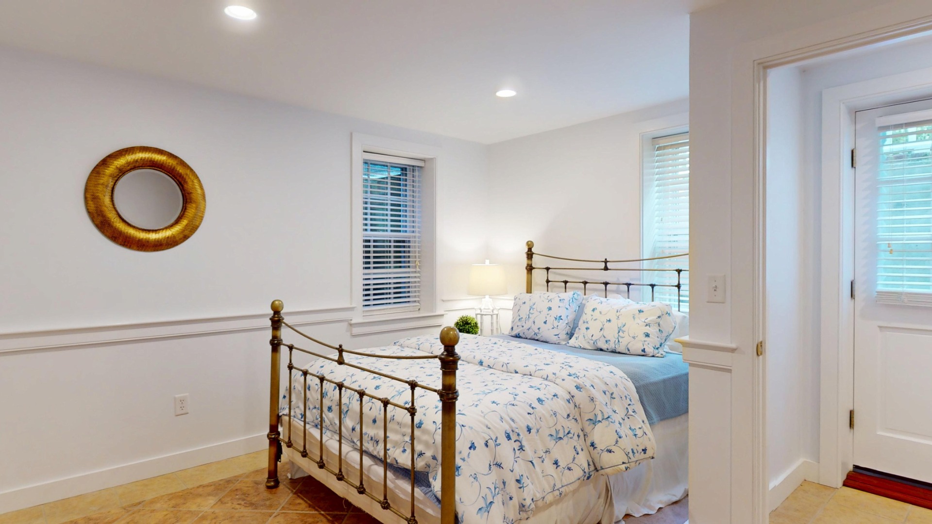 39 A Milk Street Nantucket, MA 02554 - Photo 48 of 56 a bedroom with a bed and a window