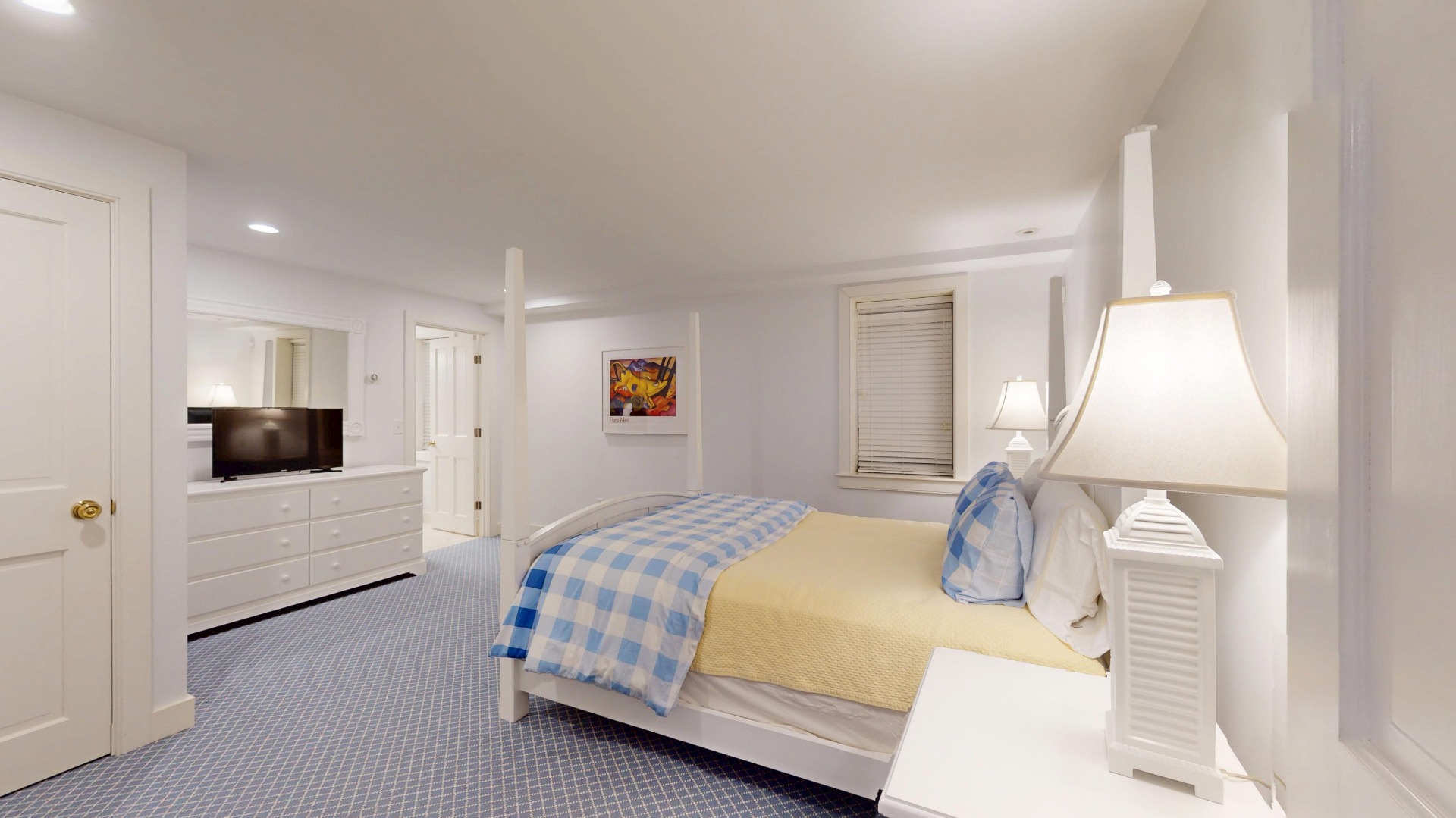 39 A Milk Street Nantucket, MA 02554 - Photo 50 of 56 a bedroom with a bed and a flat screen tv