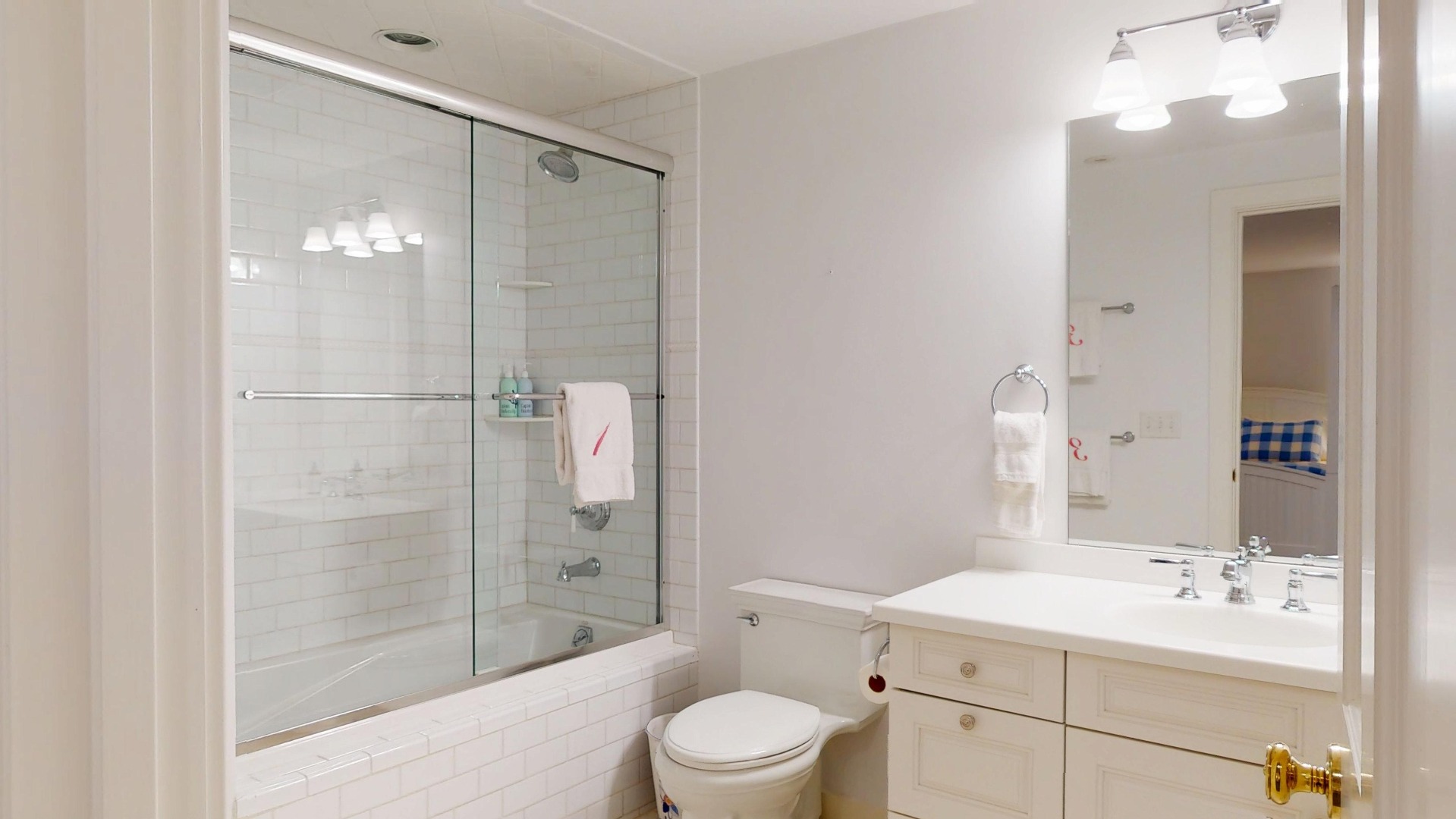 39 A Milk Street Nantucket, MA 02554 - Photo 53 of 56 a bathroom with a sink a toilet and shower