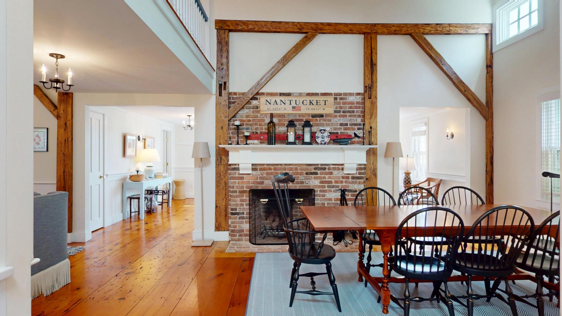 39 A Milk Street Nantucket, MA 02554 - Photo 7 of 56 a dining room with furniture garden fireplace and a chandelier