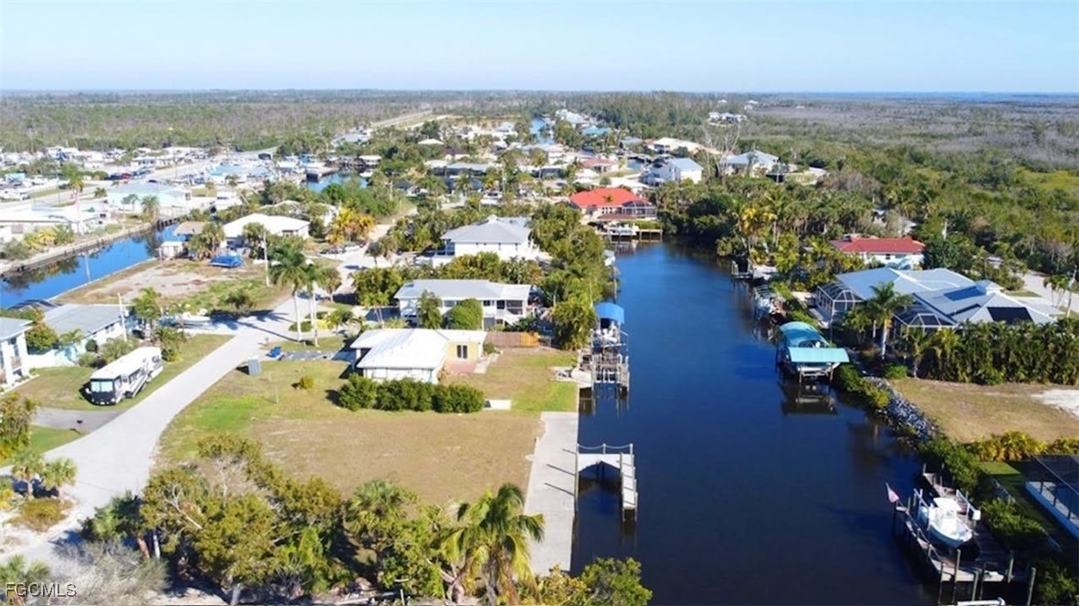 3210 Stabile Road St. James City, FL 33956 - Photo 2 of 14 an aerial view of residential houses with outdoor space