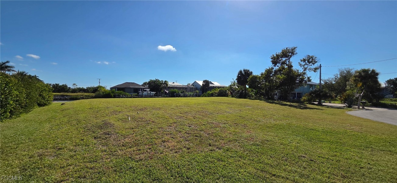 3210 Stabile Road St. James City, FL 33956 - Photo 4 of 14 a view of a field with an ocean