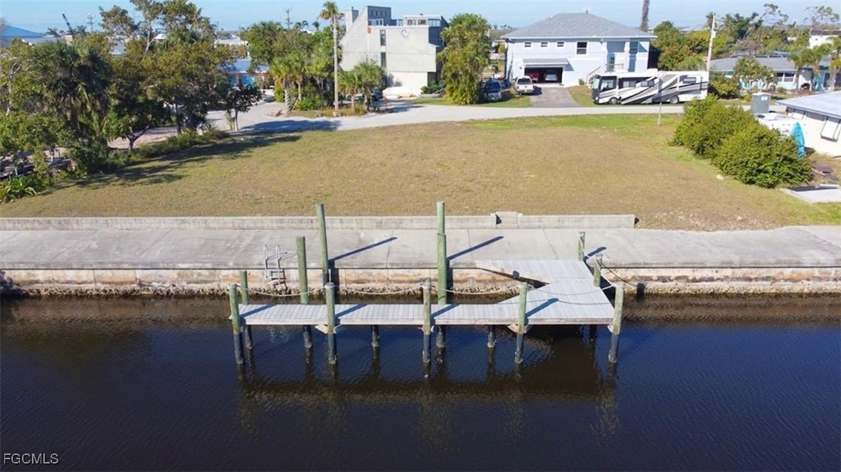 3210 Stabile Road St. James City, FL 33956 - Photo 7 of 14 a view of swimming pool with outdoor seating
