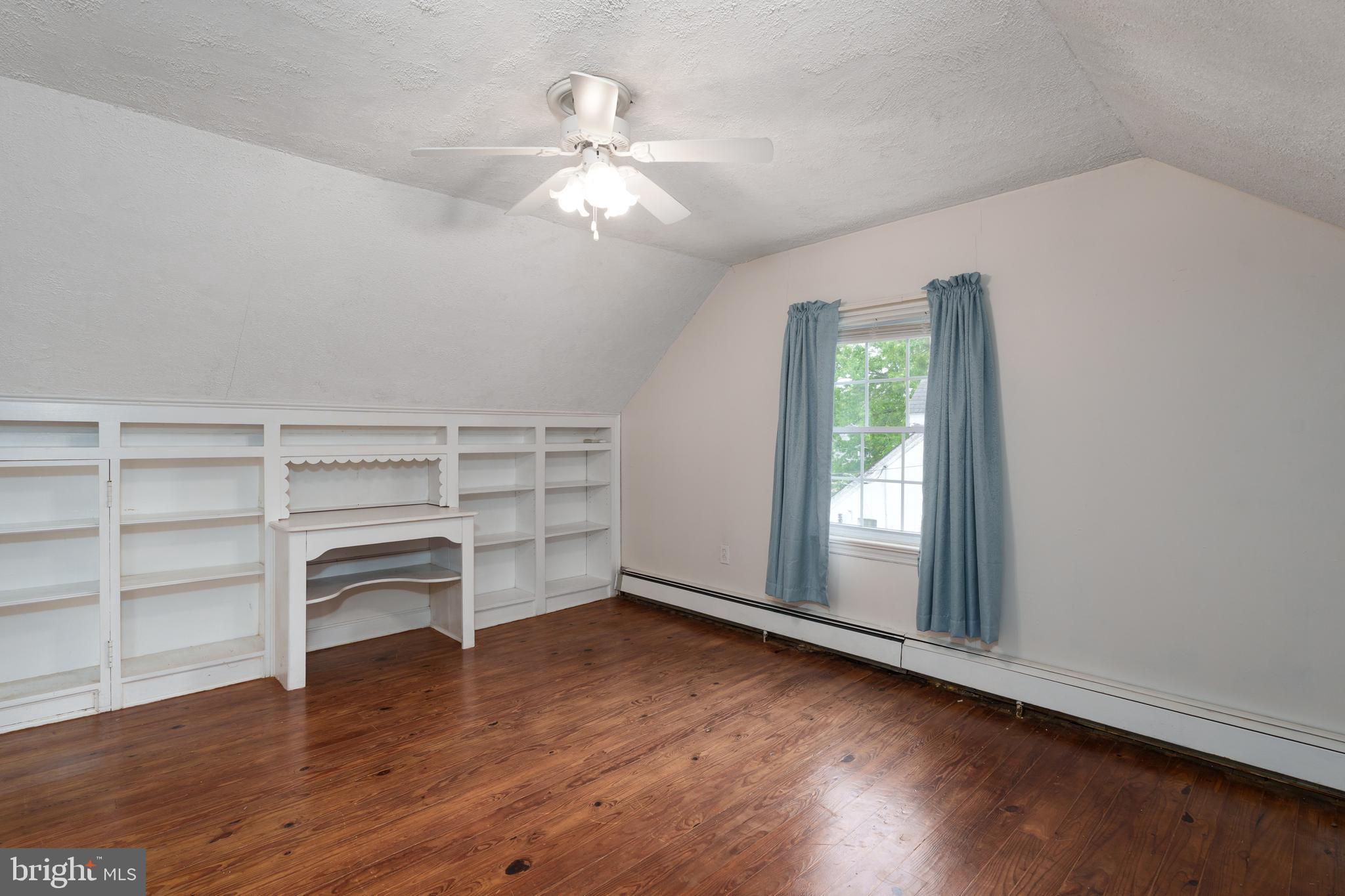 953 Klockner Road Hamilton, NJ 08619 - Photo 29 of 43 Bedroom with hardwood floor & built-ins