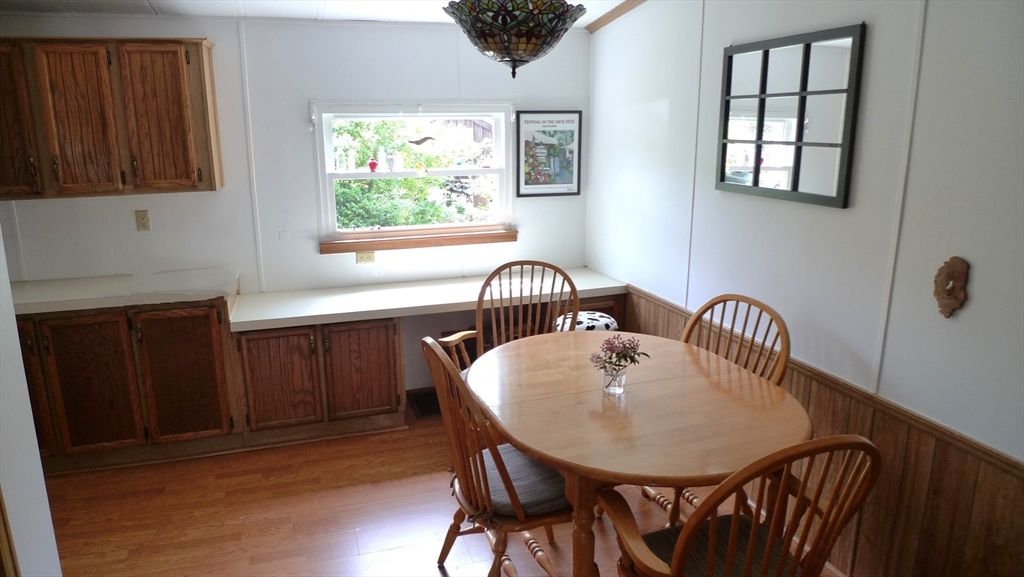41 Pipers Way Carver, MA 02330 - Photo 9 of 36 a dining room with furniture and window
