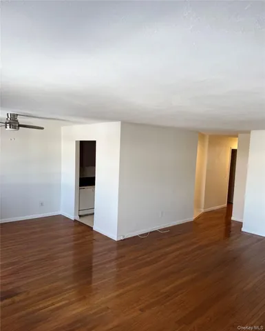 a bathroom with a toilet and a bathtub