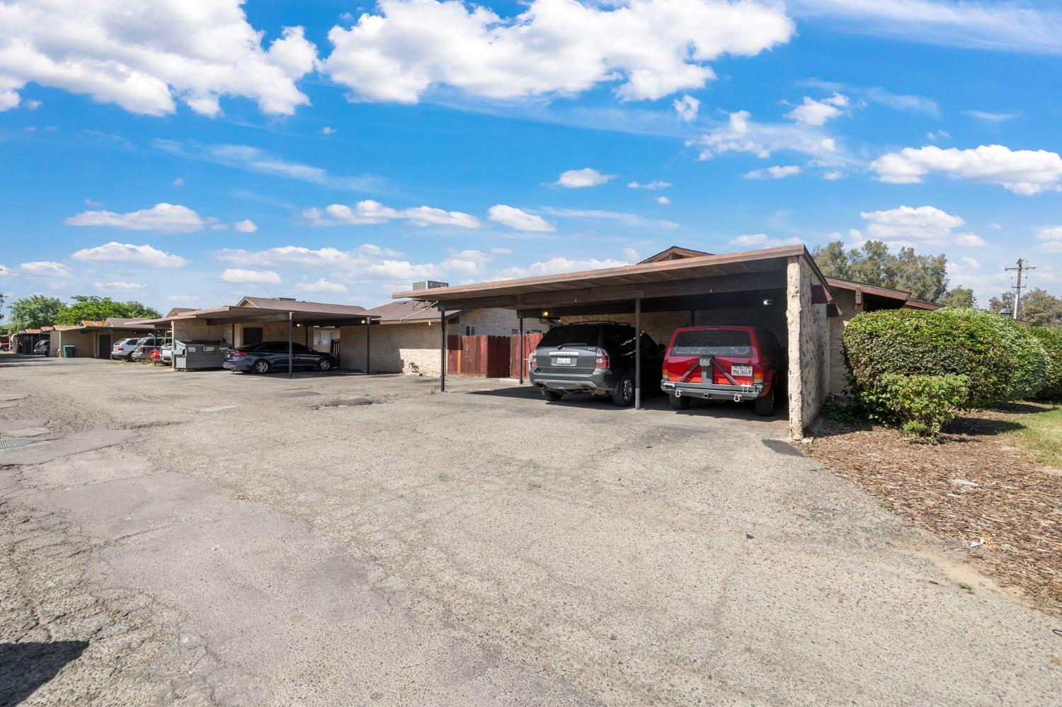 1520 South Reed Avenue Reedley, CA 93654 - Photo 16 of 20 a car parked in front of a building