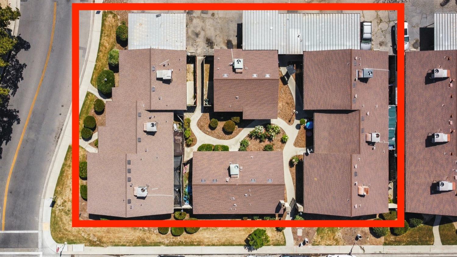 1520 South Reed Avenue Reedley, CA 93654 - Photo 4 of 20 aerial view of a house with a yard and large trees