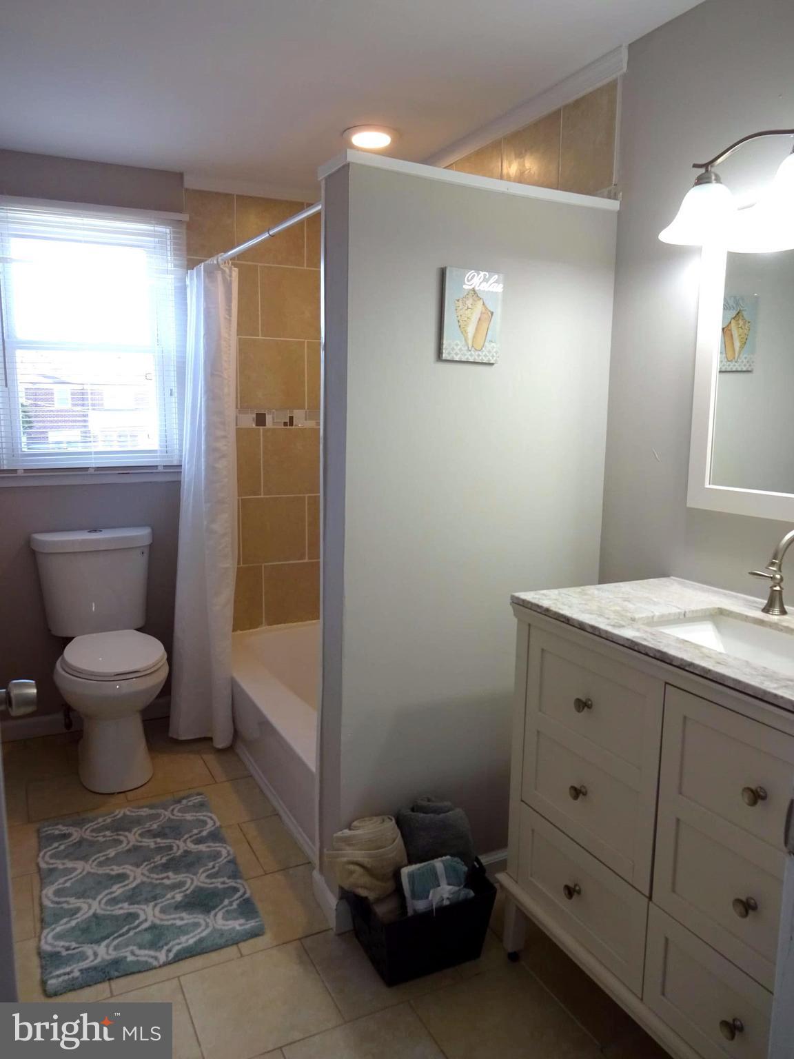 1044 Middleborough Road Baltimore, MD 21221 - Photo 12 of 18 Upper Level Updated Full Bath w/ Ceramic Tile