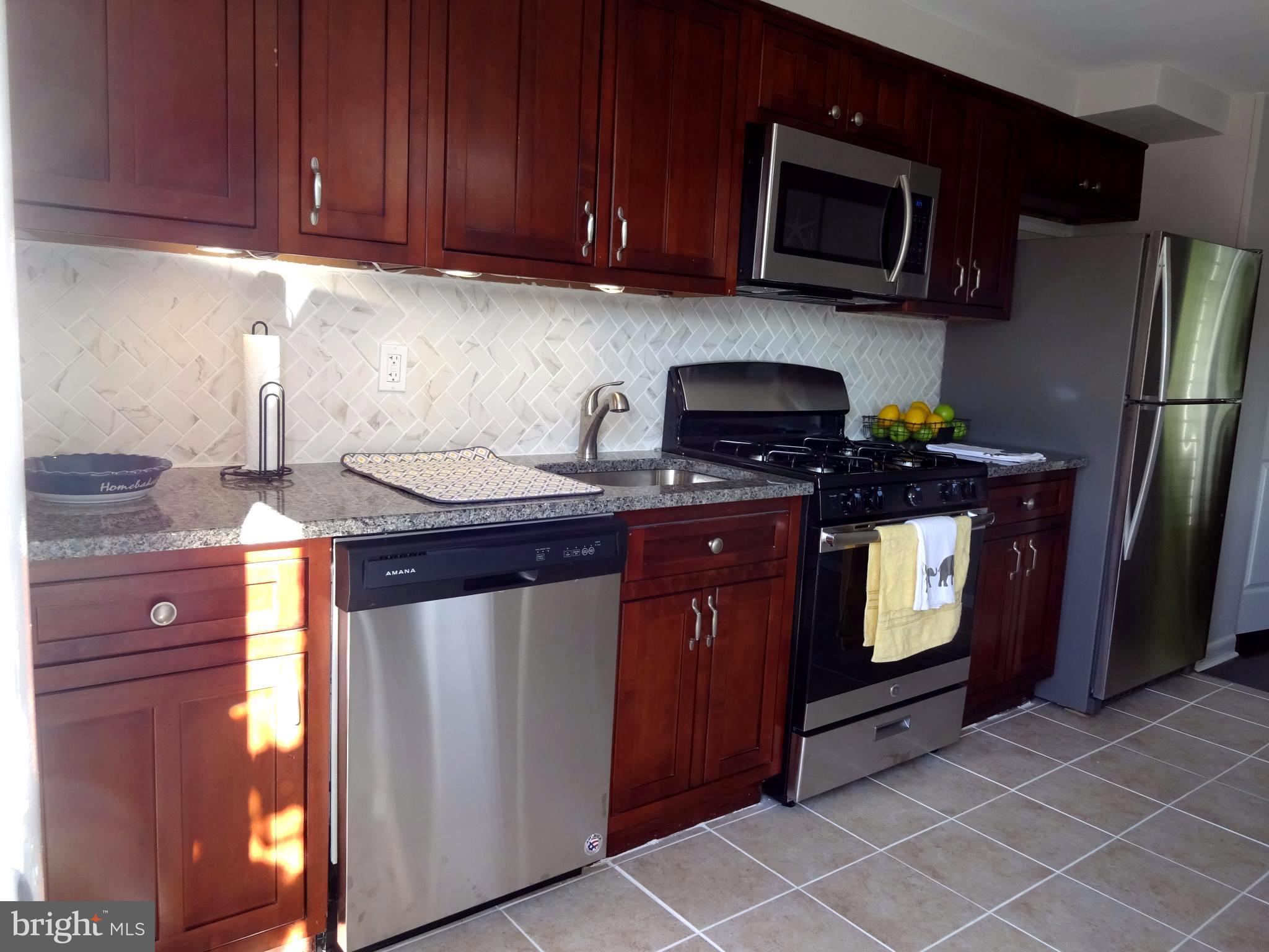 1044 Middleborough Road Baltimore, MD 21221 - Photo 8 of 18 New Stainless Appliances, Beautiful Backsplash