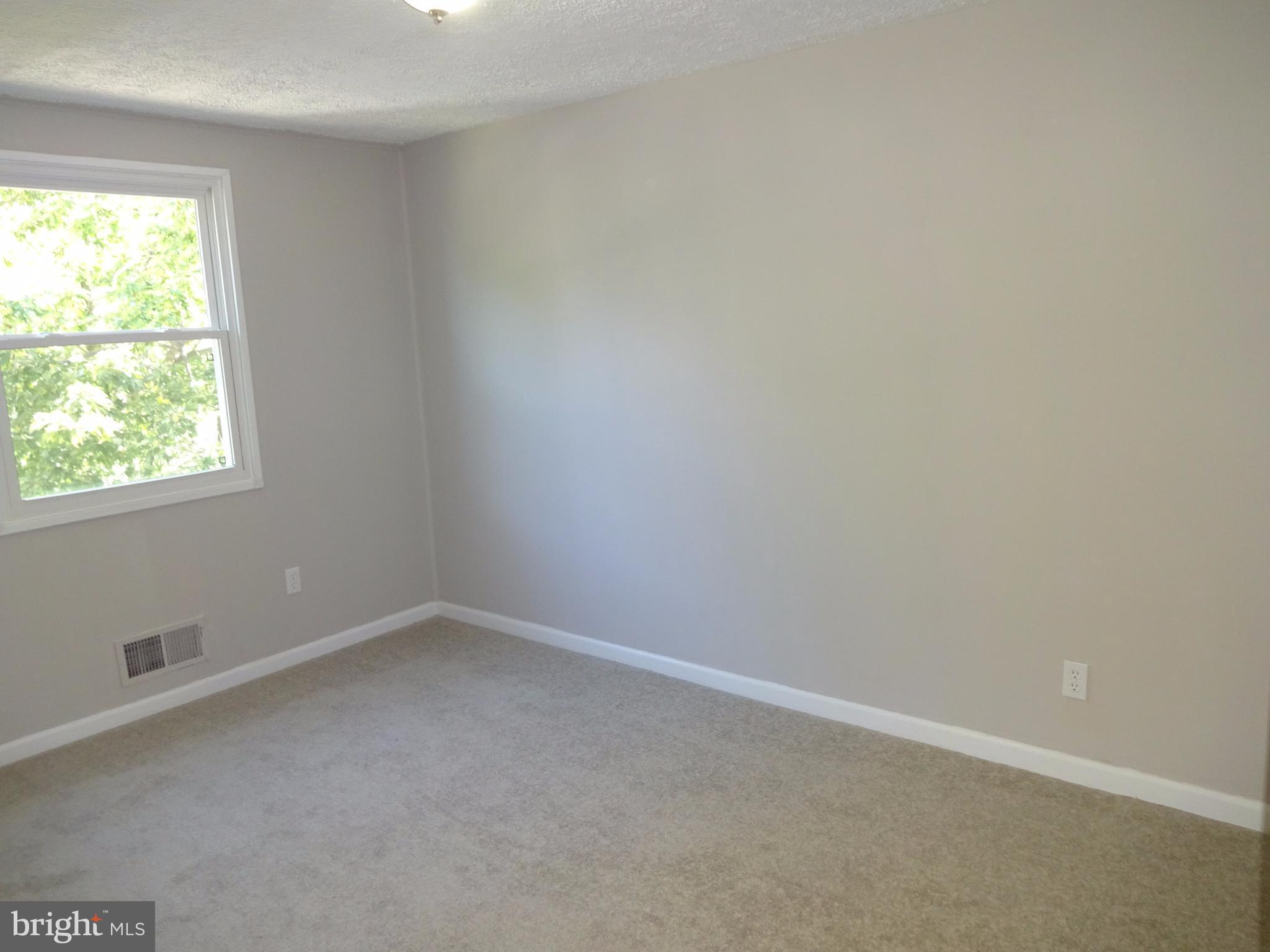 1044 Middleborough Road Baltimore, MD 21221 - Photo 9 of 18 Bedroom 2 - New Carpeting - Freshly Pained